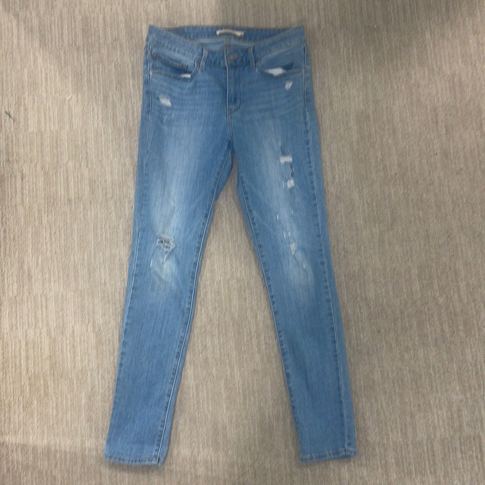 Levi’s 711 skinny with rips